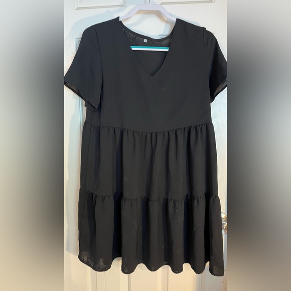 Black dress. Unknown brand. New. 100% Dacron material. Size medium. - Picture 2 of 3